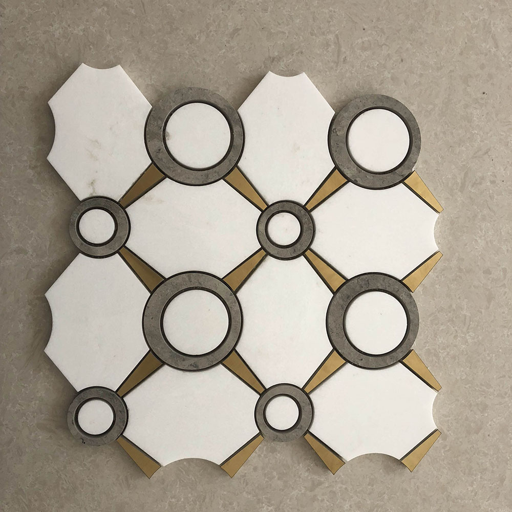 White and grey marble with gold brass waterjet mosaic