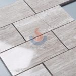 Chinese Wood Grain Grey Marble 3x6 Brick Wall Tile On Mesh -