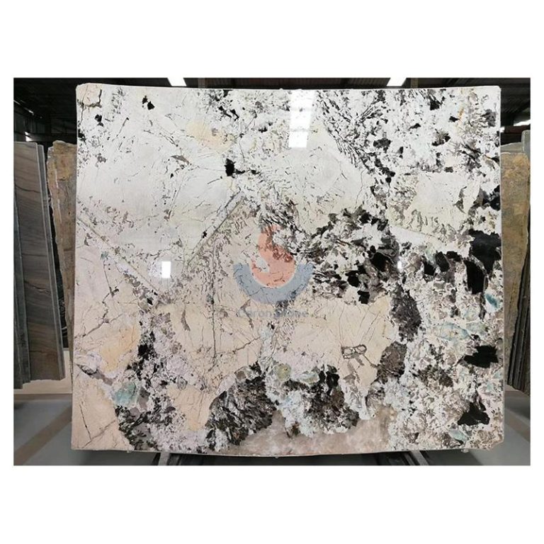 ull jumbo slab of exotic Patagonia Granite showcasing translucent quartz and ivory crystals from Caron Stone