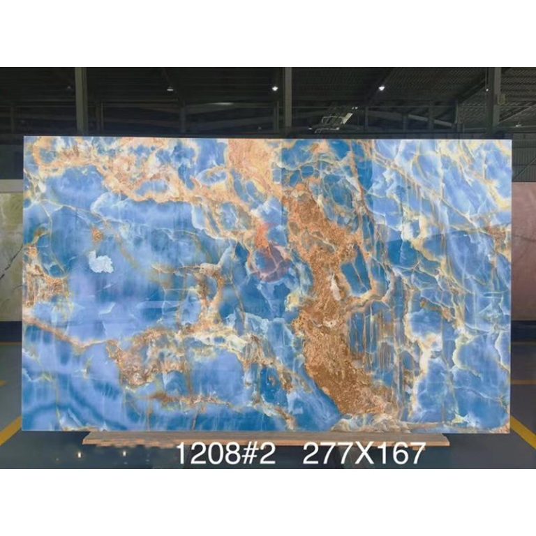 Full jumbo slab of polished Blue Onyx featuring sky-blue crystalline background and golden mineral veins by Caron Stone.