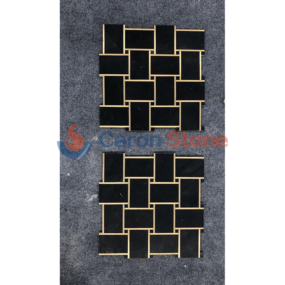 Black marble with gold brass brick mosaic subway