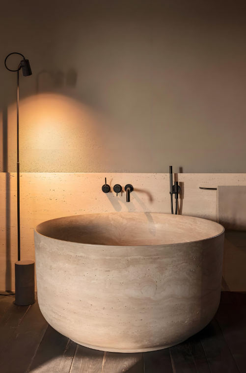 Bathroom upgrades start with a travertine bathtub