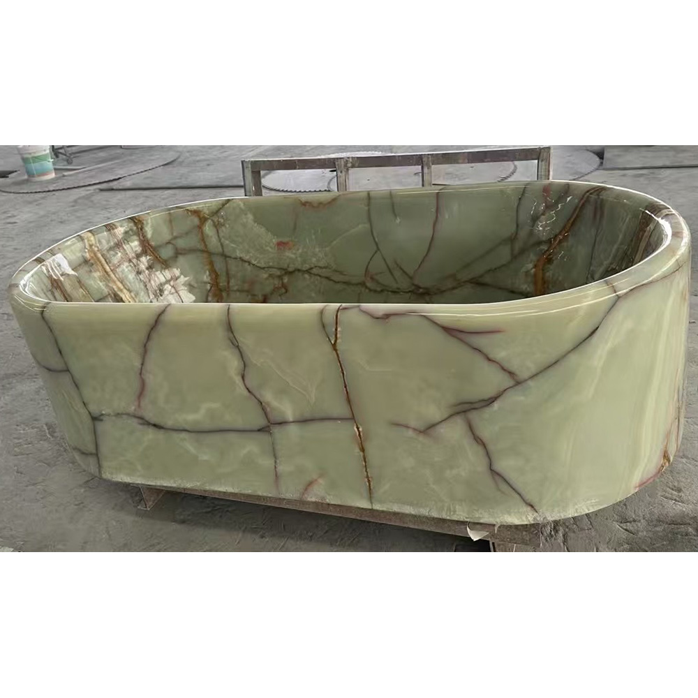 One-piece carved stone soaking tub for luxury bathrooms and hotels.
