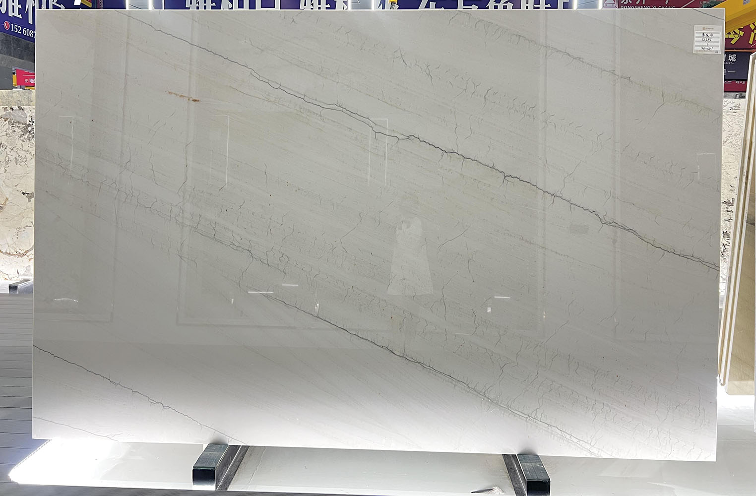 Spring Falls Quartzite slab Polished Spring Falls Quartzite slab with elegant grey veining for luxury interior wall applications.