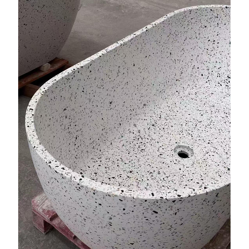 White terrazzo freestanding bathtub with black speckles for modern luxury bathrooms