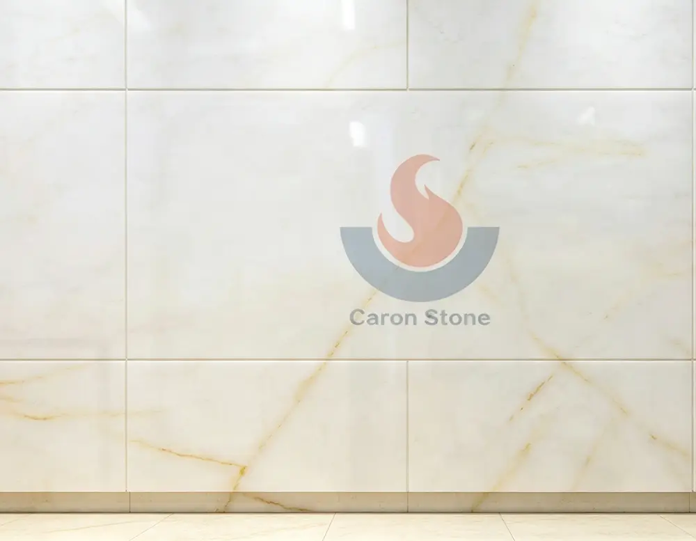 Symmetrical Bookmatched White Onyx Butterfly Design Mirrored bookmatched White Onyx slabs creating a symmetrical butterfly pattern for a wall installation.