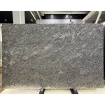 Metalicus Granite In Elegant Silver Veining And Warm Gold Accents -