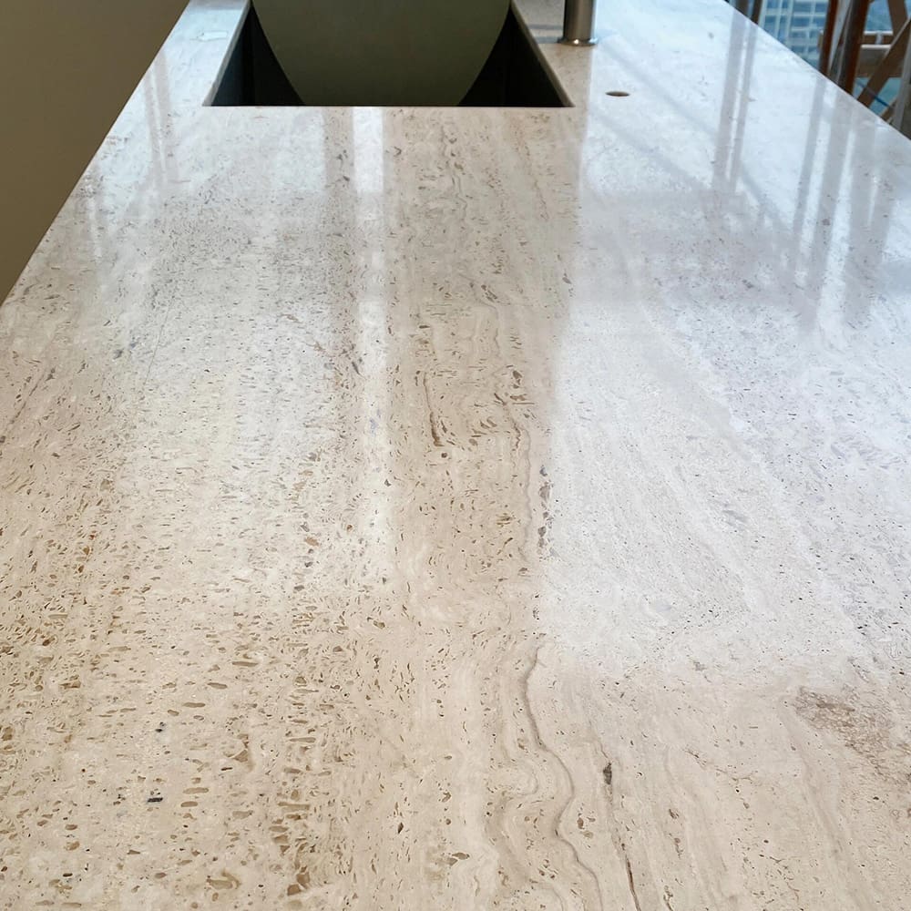 natural-travertine-kitchen-island-vein-cut-waterfall