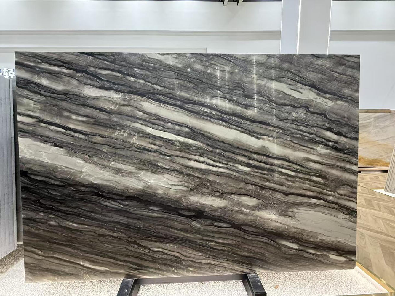 sequoia-norwegian-wood-quartzite-slab Polished Sequoia Norwegian Wood Quartzite slab featuring distinctive grey and brown linear veins resembling natural wood grain, ideal for high-end wall panels and luxury flooring designs.